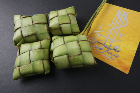 Rice dumpling and money packet decoration for Eid Mubarak celebration.の写真素材