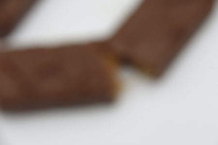 Closeup of chocolate bar isolated on whiteの写真素材