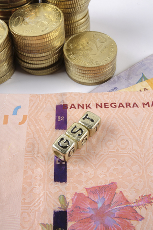 GST wording and gold coins.の写真素材