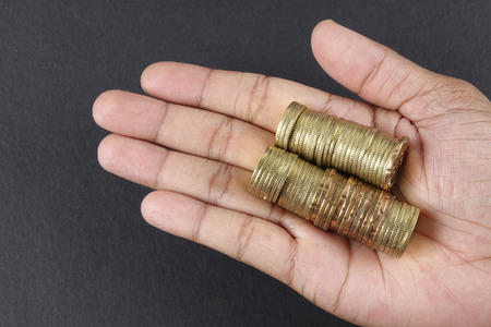 Coins in the palm. Business conceptの写真素材