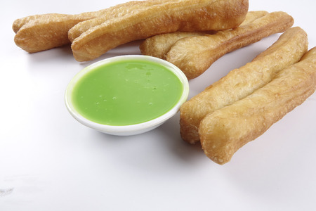 Fried bread stick with coconut jam, the bread is also popularly known as Youtiao and Cakoi, a...