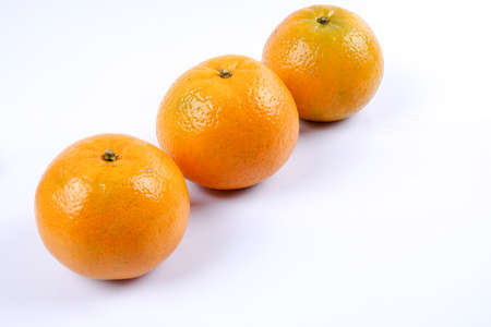 Mandarin orange citrus fruit isolated on white background.の写真素材