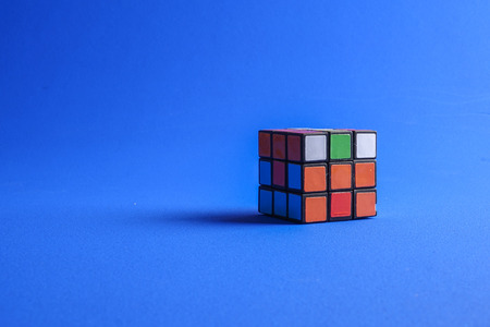 Kuala Lumpur, 24 August 2017.Rubik cube, this famous game was invented by a Hungarian architect Erno Rubik in 1974. Problem solving concept.のeditorial素材