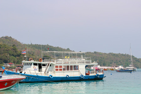 KRABI,THAILAND, MAY 2015. Longtale boats/modern boats at the beautiful beach, Thailand is the popular transportation mode at Krabi Islands, Thailand.のeditorial素材