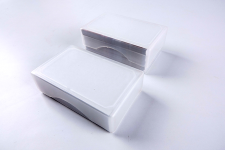 Two boxes of calling cards isolated on white.の写真素材