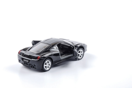 KUALA LUMPUR, 10 DECEMBER 2017. Maniature sport car Porsche isolated on white.