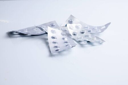 Empty medicine pill package isolated on white.の写真素材