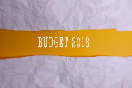 Business concept : White Torn paper  with BUDGET 2018. Blur imageの写真素材