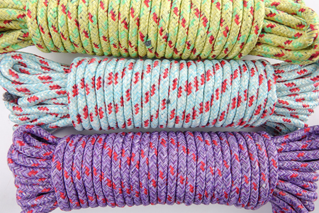 Various colour of ropes isolated on white background.