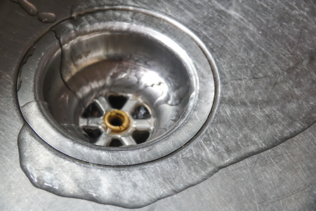 A stainless steel kitchen sink drain, detailの写真素材