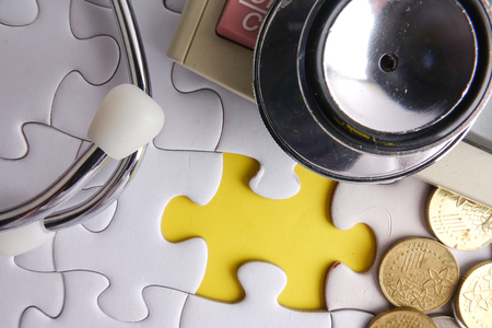 MEDICAL CONCEPT; Stethoscope,jigsaw puzzle  and sticker. Copy spaceの写真素材