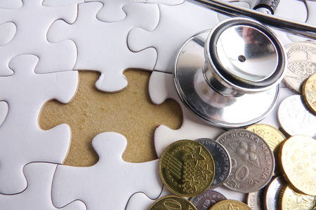 MEDICAL CONCEPT; Stethoscope,jigsaw puzzle  and sticker. Copy spaceの写真素材