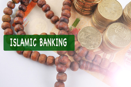 Rosary and coins. Islamic Banking/Finance concept.の写真素材