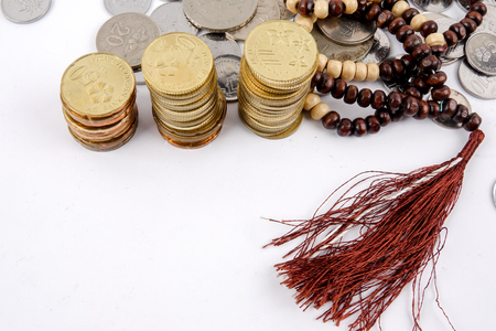 Rosary and coins. Islamic Banking/Finance concept.の写真素材