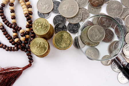 Rosary and coins. Islamic Banking/Finance concept.の写真素材