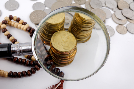 Rosary and coins. Islamic Banking/Finance concept.の写真素材