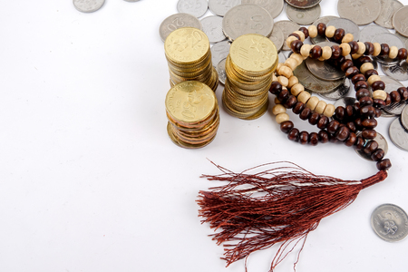Rosary and coins. Islamic Banking/Finance concept.の写真素材