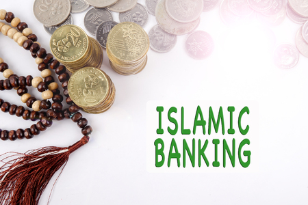 Rosary and coins. Islamic Banking/Finance concept.の写真素材