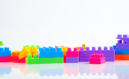 Plastic building blocks isolated on white background