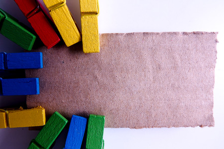 Colorful clothespins isolated on a white background.の写真素材