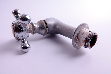 Obsolete stopcock isolated on white. Industry concept.の写真素材