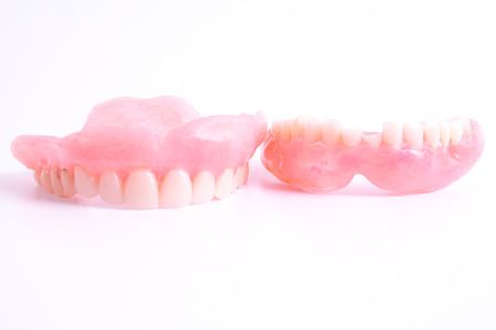 A set of dentures isolated on a white background.