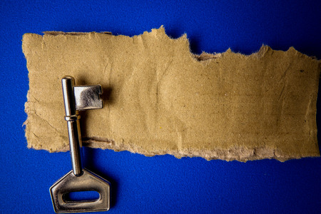 SUCCESS CONCEPTUAL with rustic  brown board and key.