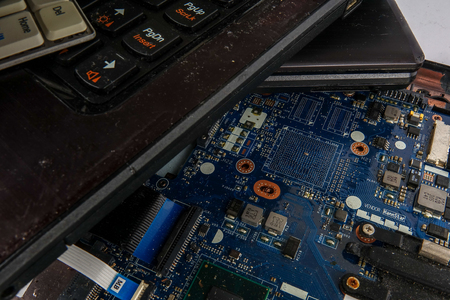 Obsolete laptops isolated on white.の写真素材