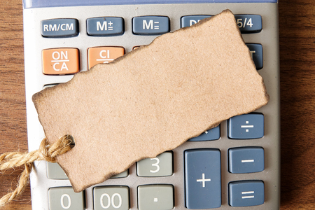 Torn book mark on calculator. Copy Spaceの写真素材