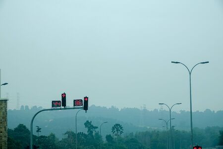 Low visibility rural view with dangerous haze and fog in Kuala Lumpur,Malaysia.の写真素材