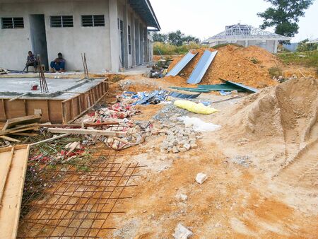 View of unorganised construction site during housing development.の写真素材