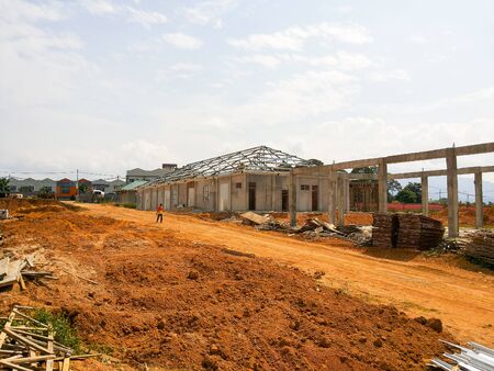 View of unorganised construction site during housing development.の写真素材