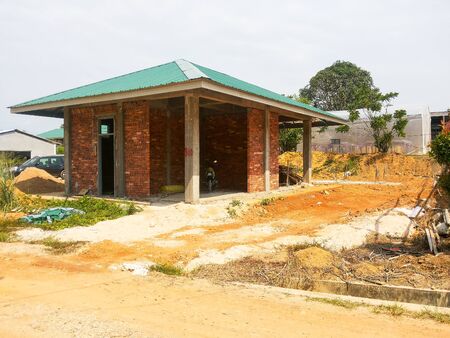 View of unorganised construction site during housing development.の写真素材