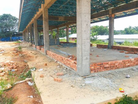View of unorganised construction site during housing development.の写真素材