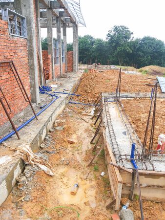 View of unorganised construction site during housing development.の写真素材