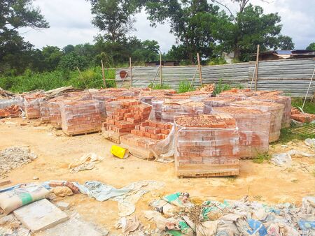 View of unorganised construction site during housing development.の写真素材