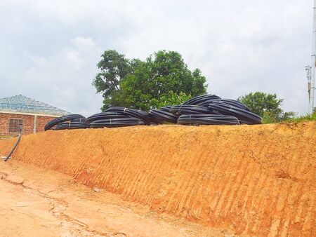 View of unorganised construction site during housing development.の写真素材