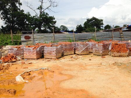 View of unorganised construction site during housing development.の写真素材