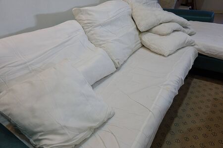 Uncover sofa ready for laundry.の写真素材