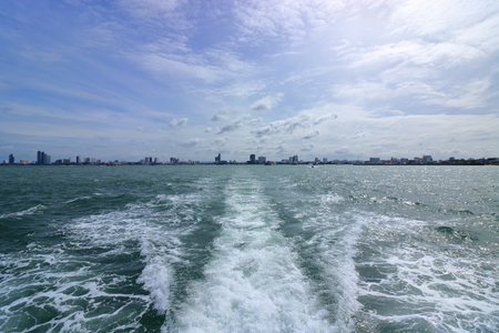 Water trail surface behind a ferry boat.の写真素材