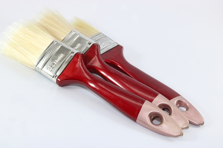 Stack of three paint brush isolated on white backgroundの写真素材