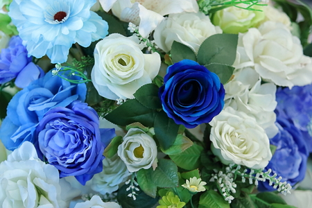 Artificial colorful of Rose flower decor background for text message.の写真素材
