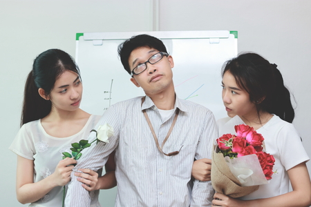 Vintage toned image of complicated relationship between three people. Love triangle concept.の写真素材