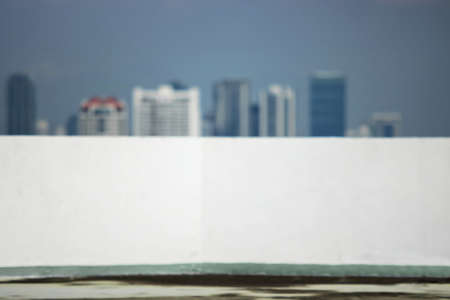 Abstract blurred concrete wall with modern skyscrapers background.の写真素材