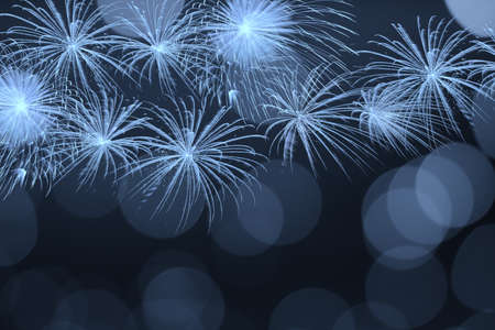 Blue firework and blurred bokeh light with copy space in Christmas and New Year. Abstract background holiday concept.の写真素材