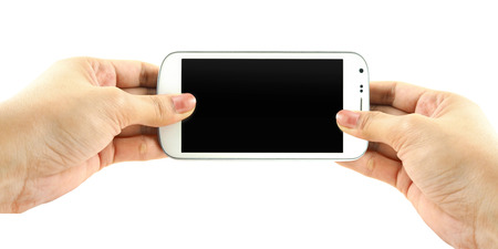 Hands holding white phone isolate  on white backgroundの写真素材