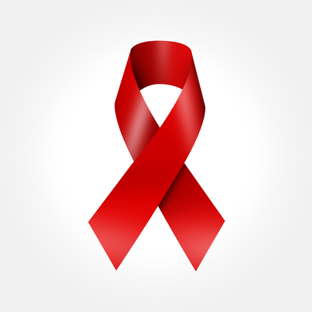 Red awareness ribbon isolated on backgroundの写真素材