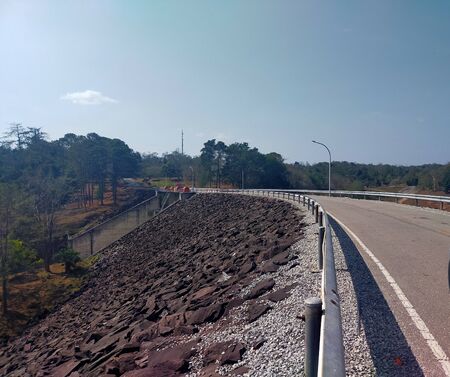 Road over dam on summer in Thailandの写真素材