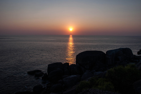 sunset at coast of the seaの写真素材