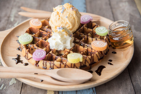 vanilla ice cream waffle and chocolate sauceの写真素材